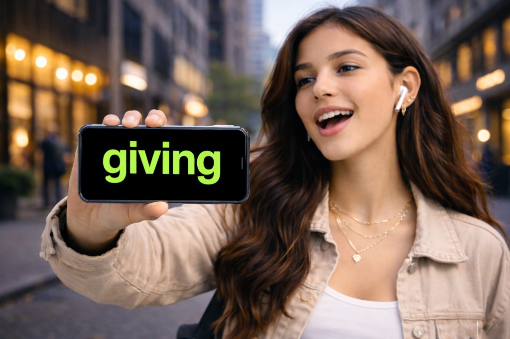 TalkTick app showing 'giving' text on screen